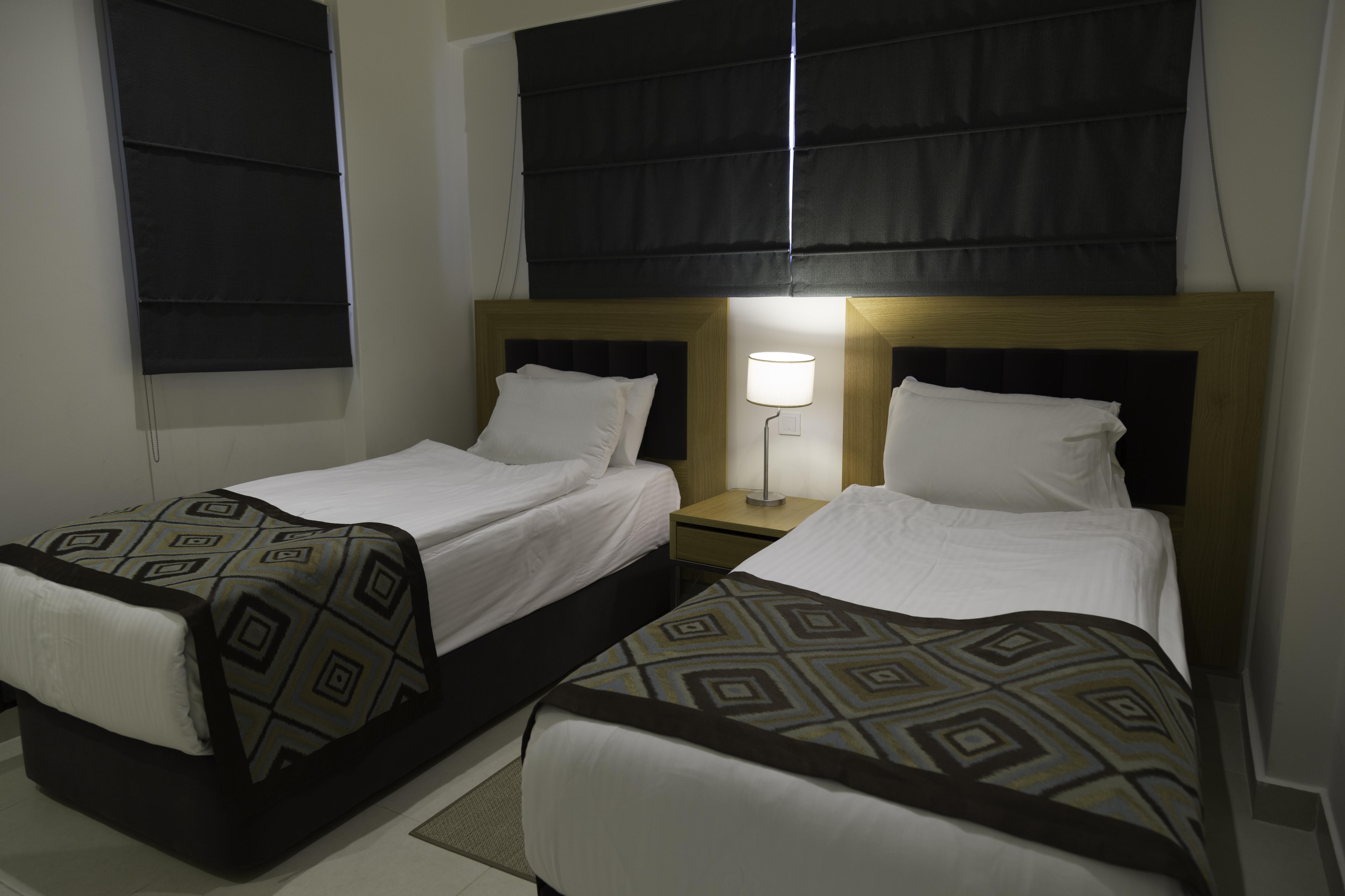 Ramada Resort Kusadasi & Golf Exteriér fotografie A bedroom at the hotel